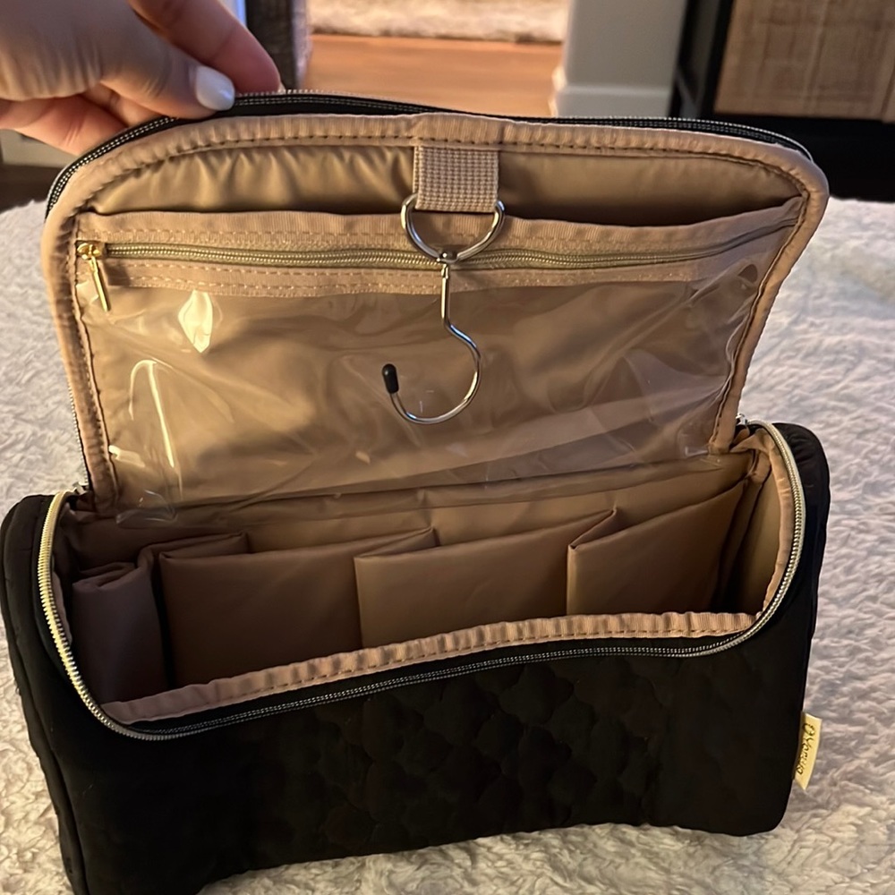 Hanging toiletry bag. Used once for my Dyson air wrap. Like new.